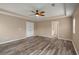 Bright main bedroom features vinyl plank flooring, ample natural light and neutral decor at 9000 Hema Ln, Summerville, SC 29483