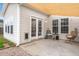 Patio with concrete floor, awning, outdoor furniture, and access to house at 9000 Hema Ln, Summerville, SC 29483