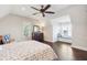 Bright bedroom featuring a window seat, ceiling fan, and dark wood floors at 939 White Point Blvd, Charleston, SC 29412