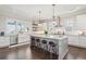 Bright kitchen features an island, stainless steel appliances, and lots of countertop space at 939 White Point Blvd, Charleston, SC 29412