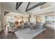 Inviting open-concept living room with dark wood floors and easy access to the kitchen and entryway at 939 White Point Blvd, Charleston, SC 29412