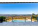 Breathtaking water view from the balcony showcasing a bridge, docks, and a luxurious swimming pool at 939 White Point Blvd, Charleston, SC 29412