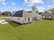 Exterior view of home showing the spacious backyard and long driveway at 00 N Highway 17, McClellanville, SC 29458