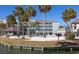 Luxury condos feature a community pool, grilling area, and lovely landscaping along the waterfront at 102 Mariners Cay Dr, Folly Beach, SC 29439