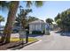 Private community entrance with guard house, well-maintained landscaping, and visitor access at 102 Mariners Cay Dr, Folly Beach, SC 29439