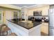 Well-appointed kitchen featuring granite countertops, sleek appliances, and ample cabinet space for all your cooking needs at 102 Mariners Cay Dr, Folly Beach, SC 29439