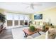 Cozy living room with large windows framing picturesque water views and plenty of natural light at 102 Mariners Cay Dr, Folly Beach, SC 29439