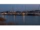 Picturesque marina with boats docked, showcasing waterfront living and recreational opportunities at 102 Mariners Cay Dr, Folly Beach, SC 29439