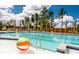 Community pool featuring crystal clear water and playful beach balls under a sunny sky at 1035 Swamp Rose Run, Summerville, SC 29485