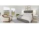 Cozy bedroom with neutral tones, plush carpeting, and lots of natural light at 1037 Swamp Rose Run, Summerville, SC 29485