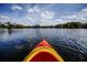 Kayaking adventure offering stunning views of the lake under a partly cloudy sky at 1037 Swamp Rose Run, Summerville, SC 29485