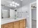 Bright bathroom features a large mirror over the vanity and a glass-enclosed shower at 1070 Moss Grove Dr, Moncks Corner, SC 29461