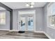 Bright dining room featuring modern flooring, access to outdoor space, and neutral paint at 1070 Moss Grove Dr, Moncks Corner, SC 29461