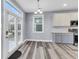 Bright kitchen featuring stainless steel appliances, light countertops, and double doors to the exterior at 1070 Moss Grove Dr, Moncks Corner, SC 29461