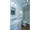 Bright bathroom features a marble vanity and new fixtures, and tiled shower-tub at 111 Carver St, Walterboro, SC 29488