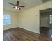 Clean bedroom featuring hardwood floors, fresh paint, and natural light at 111 Carver St, Walterboro, SC 29488