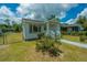 Charming single story home featuring a covered front porch and freshly cut lawn at 111 Carver St, Walterboro, SC 29488