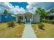 Well-manicured single story house with a sidewalk leading to the covered entrance at 111 Carver St, Walterboro, SC 29488