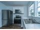 Updated kitchen with stainless steel appliances and sleek countertops at 111 Carver St, Walterboro, SC 29488