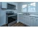 New kitchen featuring stainless steel appliances and updated countertops at 111 Carver St, Walterboro, SC 29488