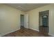 Bright living room features hard wood floors and neutral colored paint at 111 Carver St, Walterboro, SC 29488