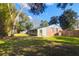The backyard features a well-maintained lawn and privacy fencing, offering a secure and private outdoor retreat at 1117 Oceanview Rd, Charleston, SC 29412