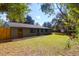 Exterior of a house in a wooded area with grass in the backyard at 1117 Oceanview Rd, Charleston, SC 29412