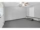 Basement featuring gray walls, gray floor, and bi-fold closet doors at 1117 Oceanview Rd, Charleston, SC 29412