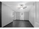 Basement featuring gray walls, gray floor, and a back door with security bars at 1117 Oceanview Rd, Charleston, SC 29412