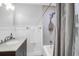 Well-lit bathroom featuring a shower-tub combination at 1117 Oceanview Rd, Charleston, SC 29412