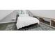 Attic bedroom features a rug and a small table at 1117 Oceanview Rd, Charleston, SC 29412