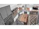 A great aerial view of a modern kitchen with stainless steel appliances and an island at 1117 Oceanview Rd, Charleston, SC 29412