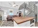 Modern living room featuring sleek appliances, ample counter space, and a central island, ideal for culinary enthusiasts at 1117 Oceanview Rd, Charleston, SC 29412