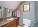 Clean bathroom with a vanity, mirror, toilet, and framed art at 112 Ravenswood Ct, Summerville, SC 29485