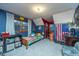 Vibrant bedroom featuring colorful decor, a window, and a bed at 112 Ravenswood Ct, Summerville, SC 29485