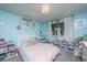 Bright bedroom with a playful decor, a bed, and a vanity area at 112 Ravenswood Ct, Summerville, SC 29485