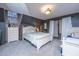 Comfortable bedroom with a bed, a dresser, a window, and gray walls at 112 Ravenswood Ct, Summerville, SC 29485