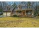Charming two-story home with a welcoming front porch, well-manicured yard, and attached two-car garage at 112 Ravenswood Ct, Summerville, SC 29485