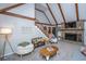 Comfortable living area with vaulted ceilings, a brick fireplace, and stylish furniture for a cozy setting at 112 Ravenswood Ct, Summerville, SC 29485
