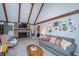 Spacious living room features a fireplace, vaulted ceilings, and a comfortable seating area with decor at 112 Ravenswood Ct, Summerville, SC 29485