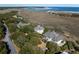 Luxury homes with mature trees and marshland views near the beach and waterway at 1136 Ocean Forest Ln, Seabrook Island, SC 29455