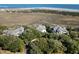 A high angle view of the property with a waterway separating the island from the mainland at 1136 Ocean Forest Ln, Seabrook Island, SC 29455