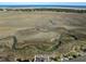A high angle view of the property with a waterway separating the island from the mainland at 1136 Ocean Forest Ln, Seabrook Island, SC 29455