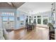 Elegant dining room features large windows with scenic views, providing a bright and inviting space at 1136 Ocean Forest Ln, Seabrook Island, SC 29455
