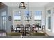 Charming dining room features a decorative chandelier and picturesque views at 1136 Ocean Forest Ln, Seabrook Island, SC 29455