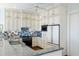 Contemporary kitchen featuring custom cabinets, granite counters, and stainless steel appliances at 1136 Ocean Forest Ln, Seabrook Island, SC 29455