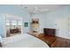 Main bedroom with a fireplace and an entrance to an office space at 1136 Ocean Forest Ln, Seabrook Island, SC 29455