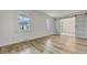 Bright bedroom with wood floors and sliding glass doors, perfect for modern living at 117 Swan Dr, Summerville, SC 29485
