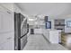 Modern kitchen with stainless steel appliances, white cabinetry, and a stylish island with breakfast bar at 117 Swan Dr, Summerville, SC 29485