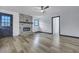 Cozy living room with new flooring, an electric fireplace and ample natural light at 117 Swan Dr, Summerville, SC 29485